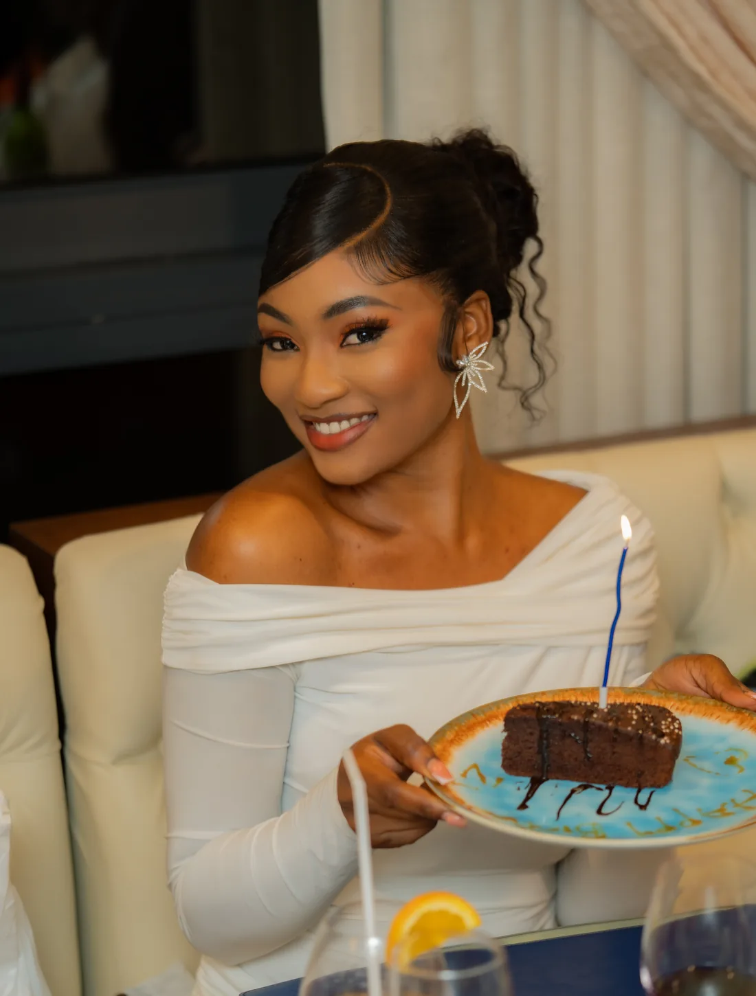 Guest celebrating a birthday with dessert at Le Pavillon