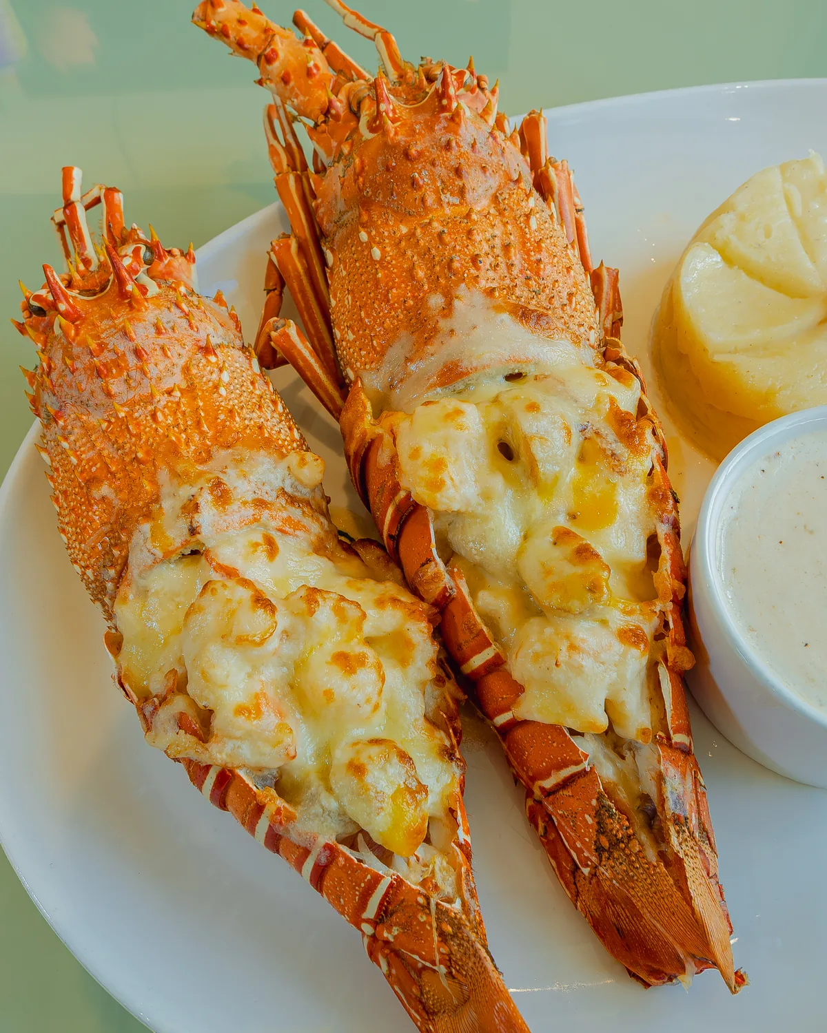 Grilled lobster presented at Le Pavillon Restaurant
