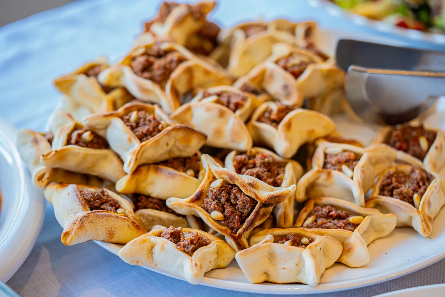 Fresh Lebanese pastries prepared for service