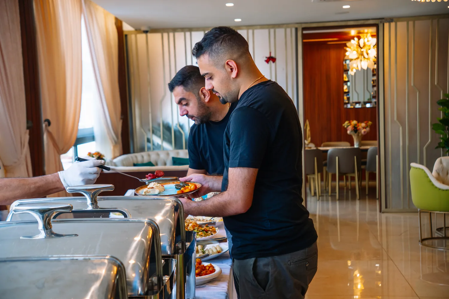 Le Pavillon team preparing a private dining spread